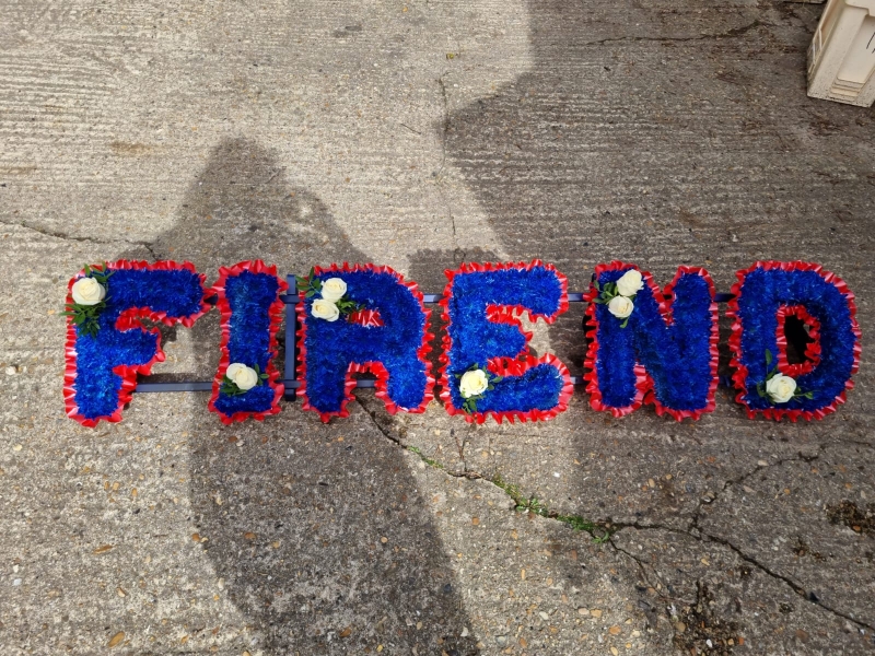 sprayed funeral letters by florist in Croydon