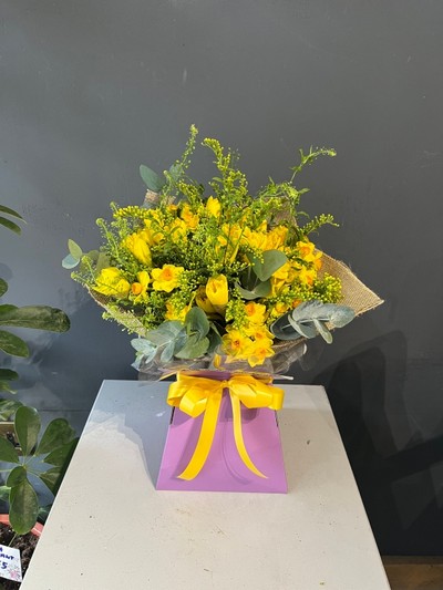 Spring bouquet made of daffodils and narcissus made by florist in Croydon 