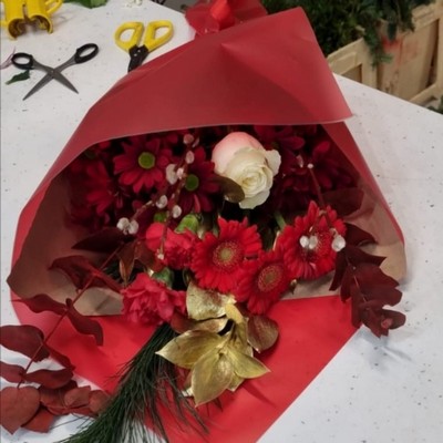 Festive Wrap of fresh Christmas flowers