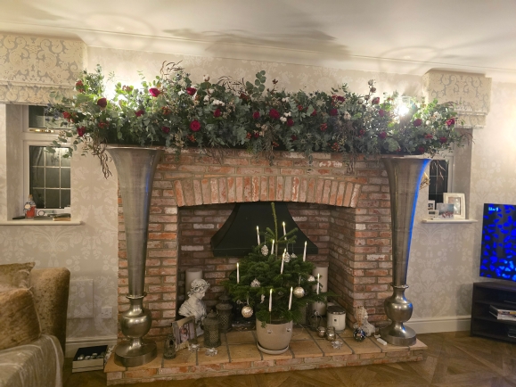 Christmas fireplace installation garland for a hime or office or restaurant or anywhere you like by Croydon Blooms florist in CR