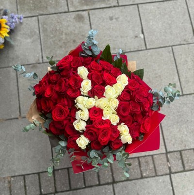 Big bouquet of red roses with white initial letter inside made by florist delivering to Croydon, Surrey