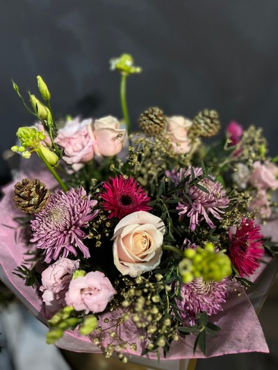 Perfect bouquet for those who like pink for Christmas. We believe this combination of pinks, winter foliages and silver decorations create unique and soft Christmas feel. Made by local florist in Croydon, Surrey, UK for guaranteed Christmas delivery in all CR postodes 