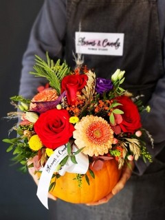 Autumn flowers pumpkin arrangement perfect for Halloween by local florist near me in Croydon