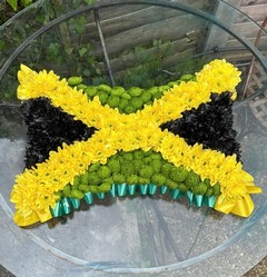 Jamaican flag funeral cushion made by florist in Croydon