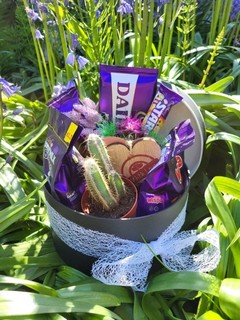 Hat box with sweets and plant made by florist in Croydon, Surrey