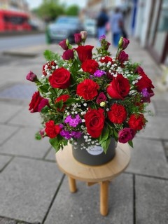Roses and carnations hat box made by florist in Croydon 