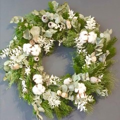 Stunning natural wreath with white ruscus, white pines, eucalyptus and white cotton handmade by florist in Croydon.